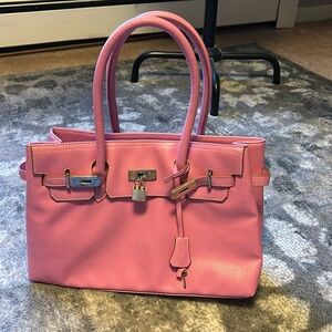 Pink handbag with lock & key